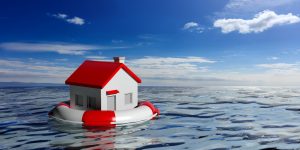 toy house floating on endless water inside a red and white life preserver